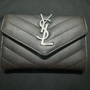 Yves Saint Laurent black wallet with silver hardware